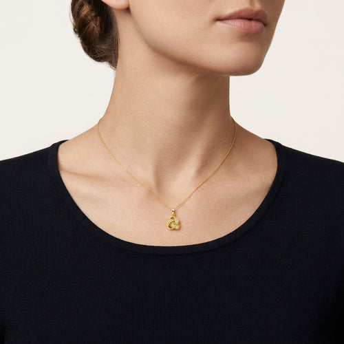 Classic Love Knot Diamond Pendant worn by model - Vicenza Miami