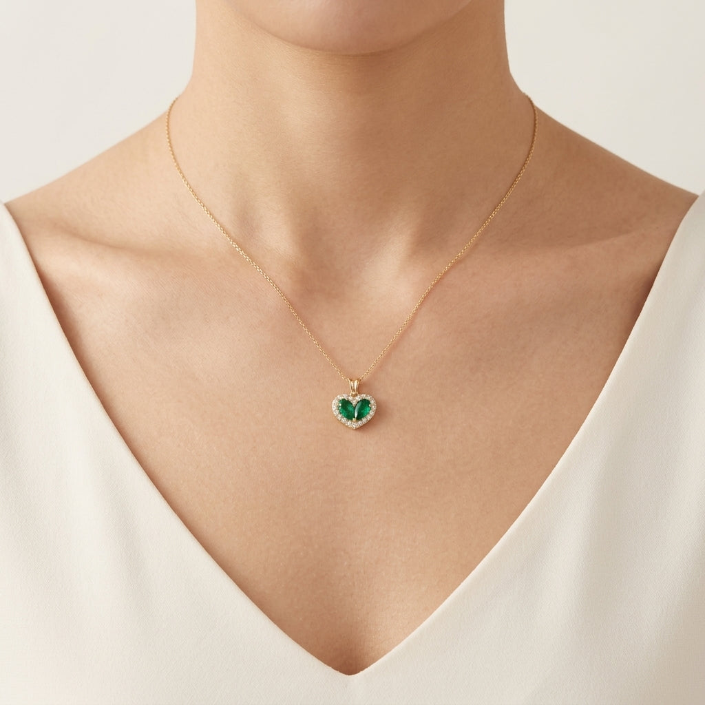 Heart Shaped Emerald Diamond Halo Pendant worn by model - Vicenza Miami