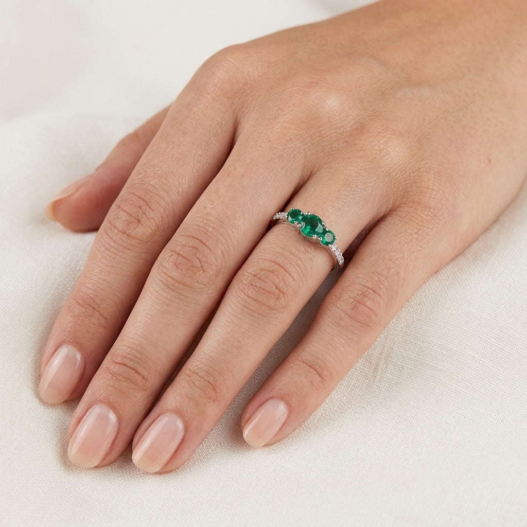 Opulent Diamond & Emerald Ring worn by model - Vicenza Miami